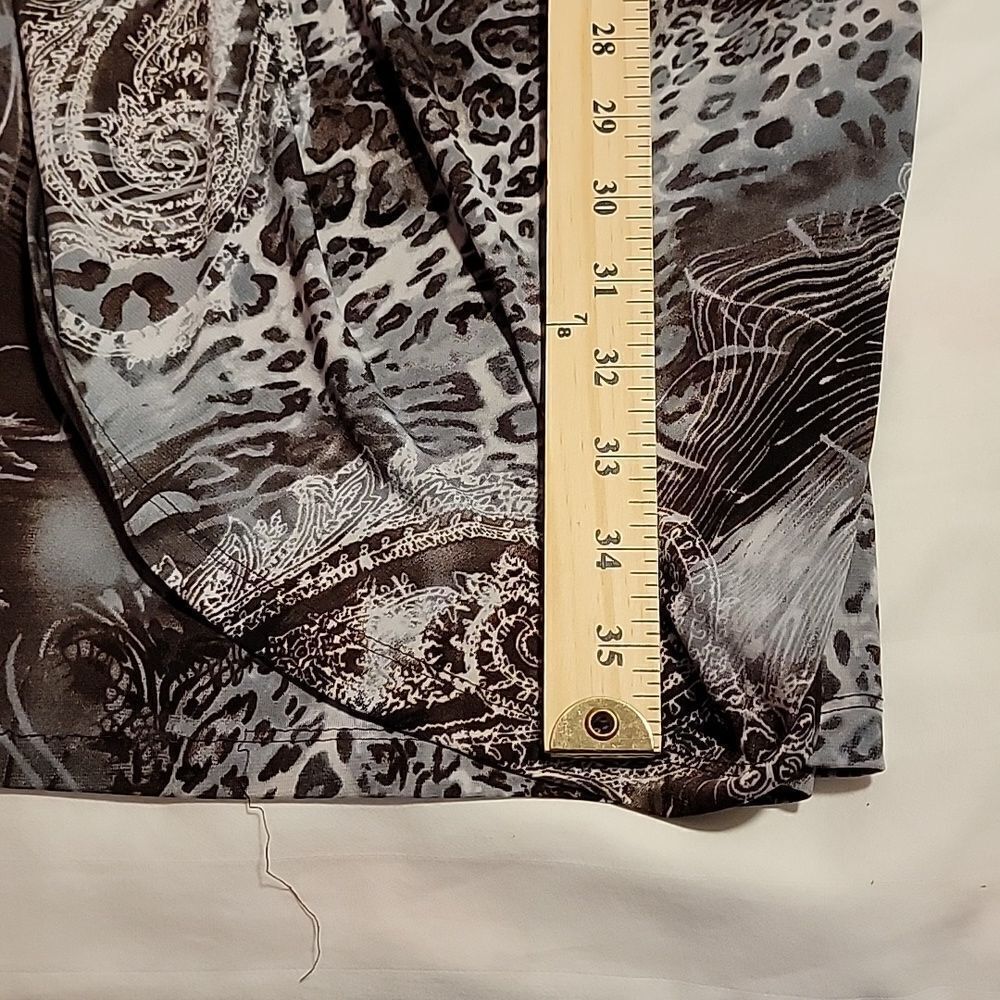Connected wrap dress. Size 8P. Brown, blue animal print - Picture 4 of 7